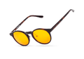 Three-quarter floating studio shot of round tortoiseshell blue light blocking glasses with vibrant yellow lenses, isolated on white.