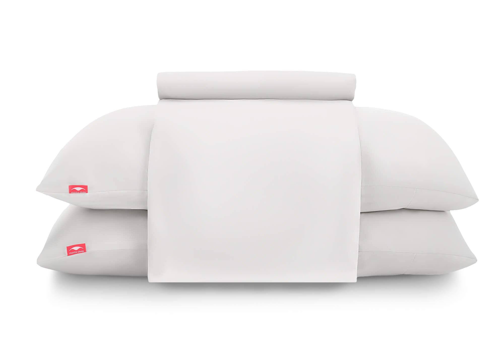 Front view of a flat sheet folded over two stacked pillows in white Manta Sleep cases, isolated on a white background.
