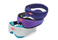 Three stacked Manta Sleep masks: a purple Manta SILK Sleep Mask on top, a blue and red Manta PRO Sleep Mask in the middle, and a grey Manta COOL Sleep Mask with blue-teal eye cups on the bottom.