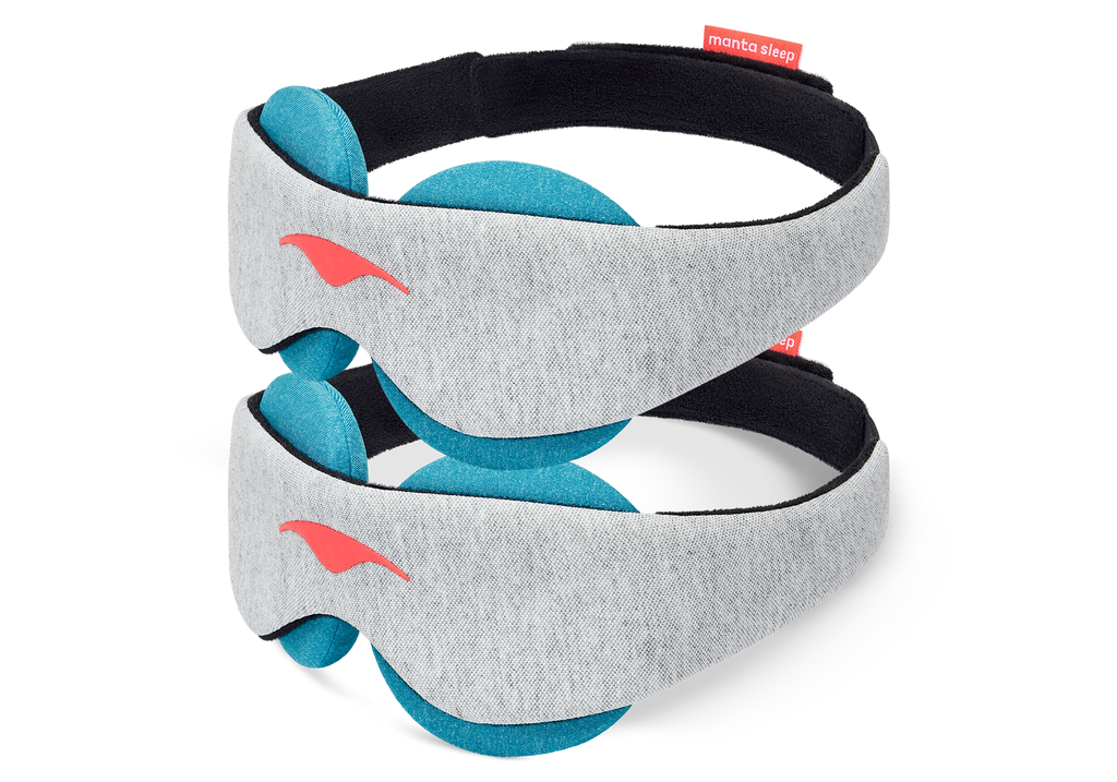 Two light grey sleep masks featuring coral logos and vibrant blue-teal circular eye cups neatly stacked on top of each other, on white.