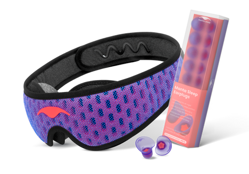 A coral-red and blue mesh Manta PRO Sleep Mask alongside a box of purple Manta Sleep Earplugs and a loose pair of earplugs, isolated on white.
