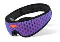 Three-quarter studio shot of the Manta PRO Sleep Mask with a blue and red mesh strap, black borders, and an coral-red Manta Sleep logo.