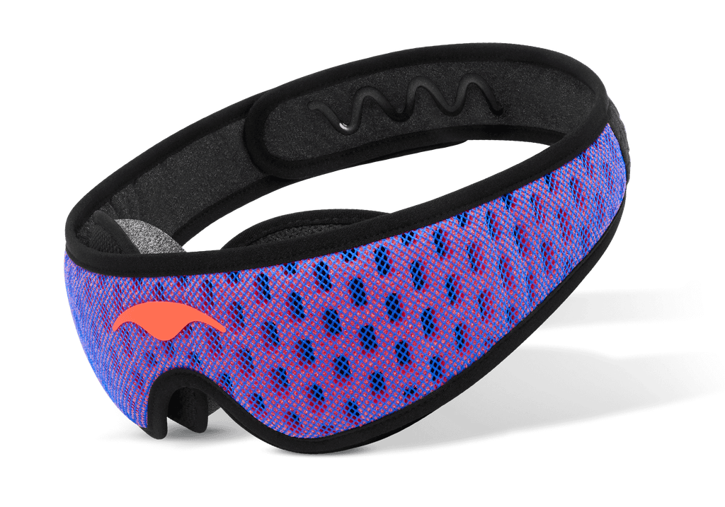 Three-quarter studio shot of the Manta PRO Sleep Mask with a blue and red mesh strap, black borders, and an coral-red Manta Sleep logo.