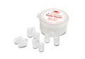Four translucent Manta Sleep nose vents displayed next to their round white plastic storage case on a white background.