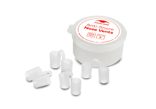 Four translucent Manta Sleep nose vents displayed next to their round white plastic storage case on a white background.