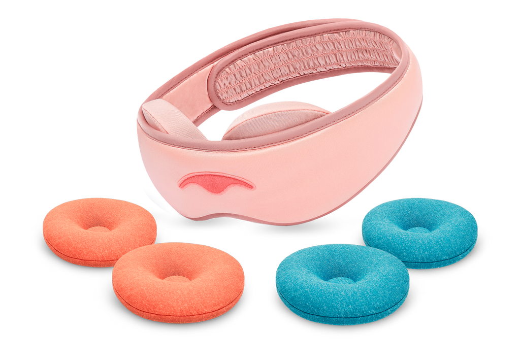 A pink Manta SILK Sleep Mask shown on a white background alongside two round orange STEAM eye cups and two round blue-teal COOL eye cups.