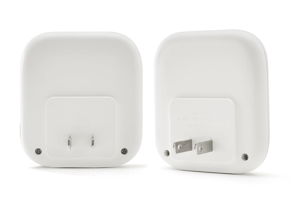 Rear and side angles of two white Manta Sleep night lights showing the integrated wall plug and electrical specifications.