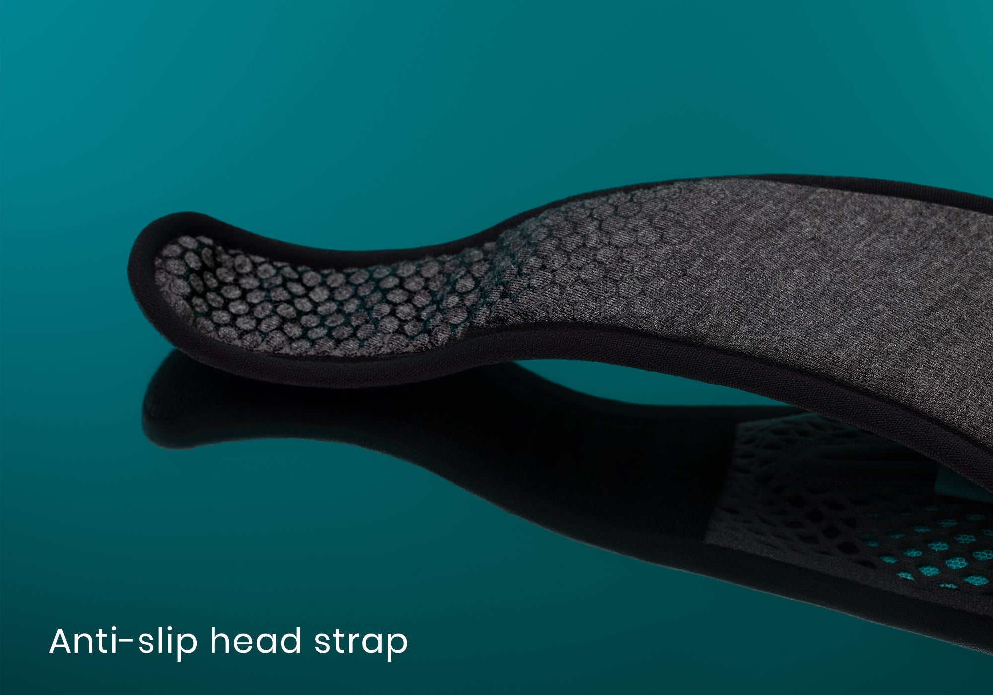 Close-up of the wavy silicon texture lining the interior of a grey fabric head strap, with text "Anti-slip head strap".