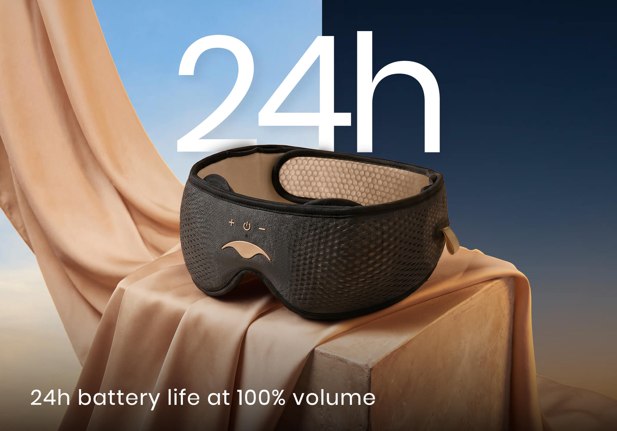Manta SOUND mask on a stone block with draping silk fabric under a day-to-night split background. Text: "24h battery life at 100% volume".