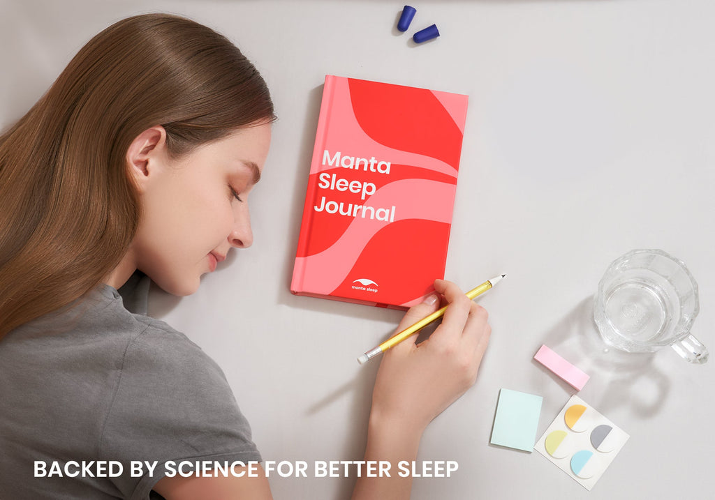 Overhead shot of a woman with closed eyes resting near a red Manta Sleep Journal, holding a pencil. Text overlay reads "Backed by science for better sleep".
