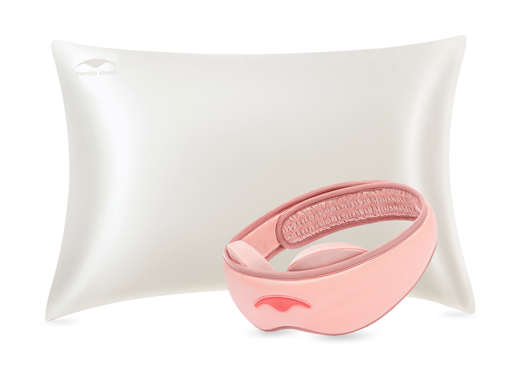 Sunset Pink Manta SILK Sleep Mask in front of a pearl white Manta Silk Pillowcase.