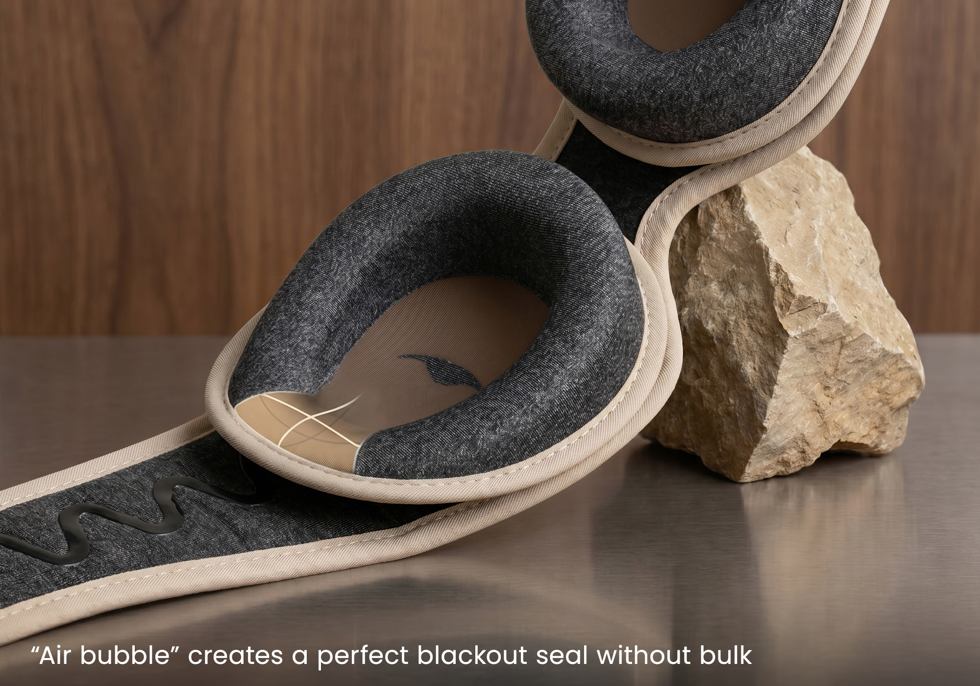 Close-up on the interior of an eye cup, with a white highlighted overlay showing the tapered edge designed for side sleepers. A text overlay at the bottom reads: "Air bubble creates a perfect blackout seal without bulk".