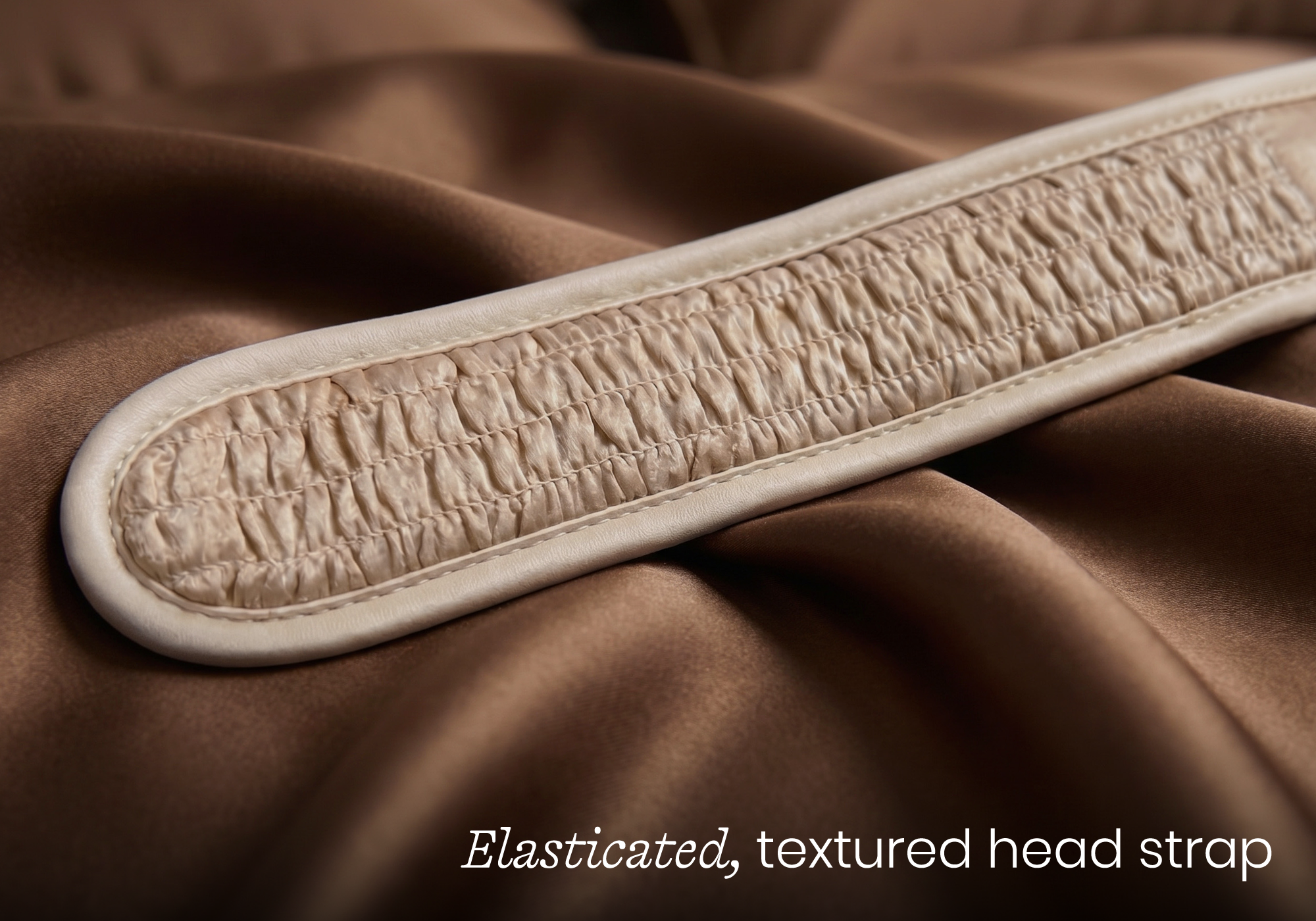 Macro close-up of a Tranquil Taupe Manta SILK Sleep Mask showing detailed ruching, captioned "Elasticated, textured head strap".