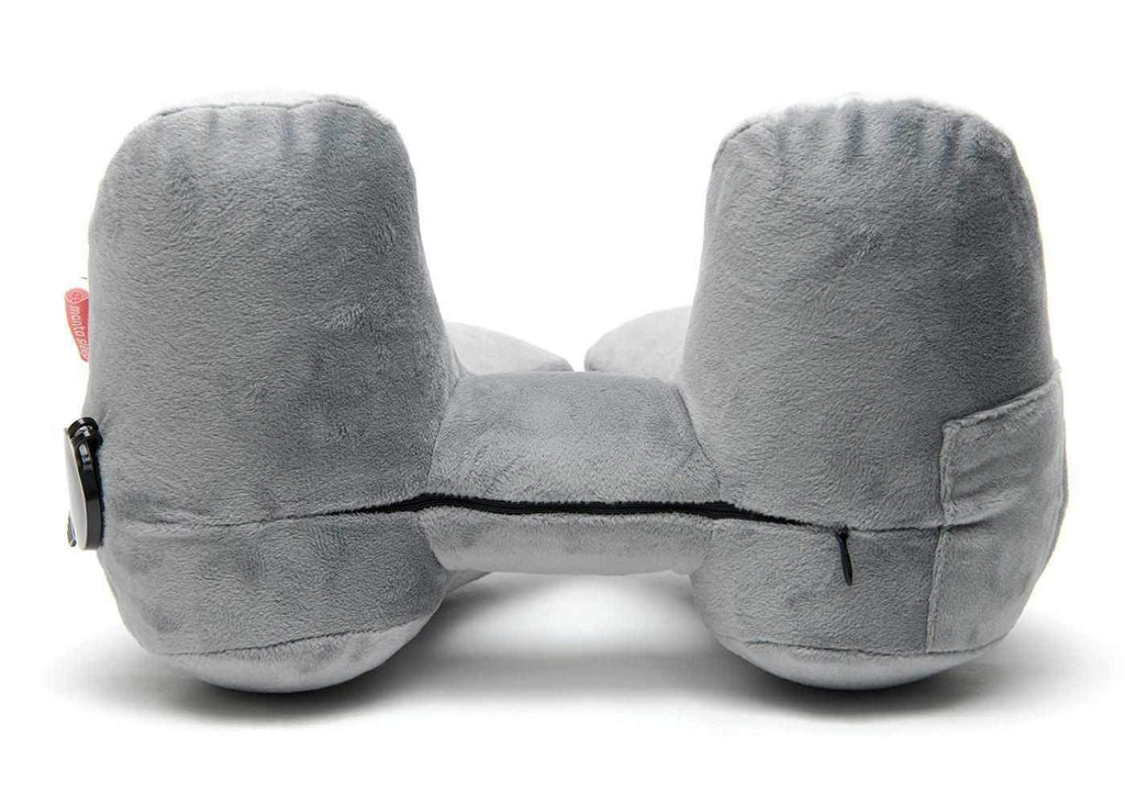 Rear view of a grey plush ergonomic Manta Travel Pillow with a central zipper, isolated on a white background.